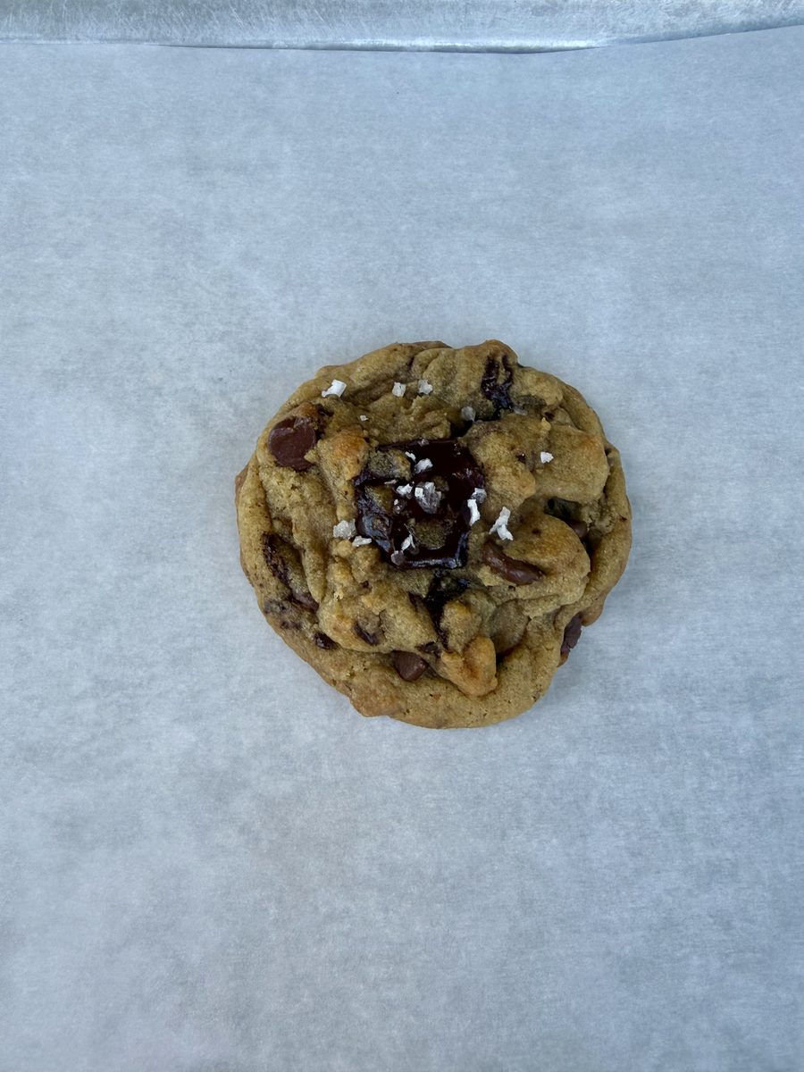 Bakery-style chocolate chip drop cookie topped with flaky sea salt
